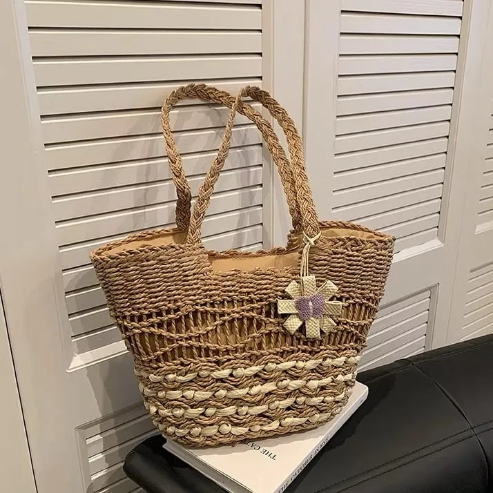 Bali Basket Bag — woven basket with flower charm
